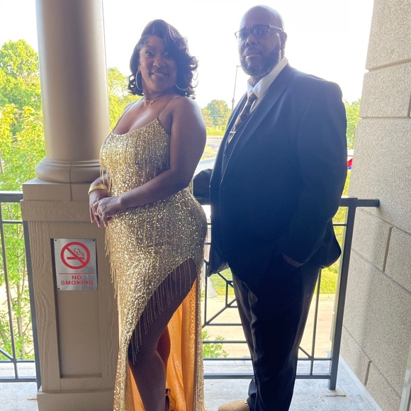 A long gold formal dress